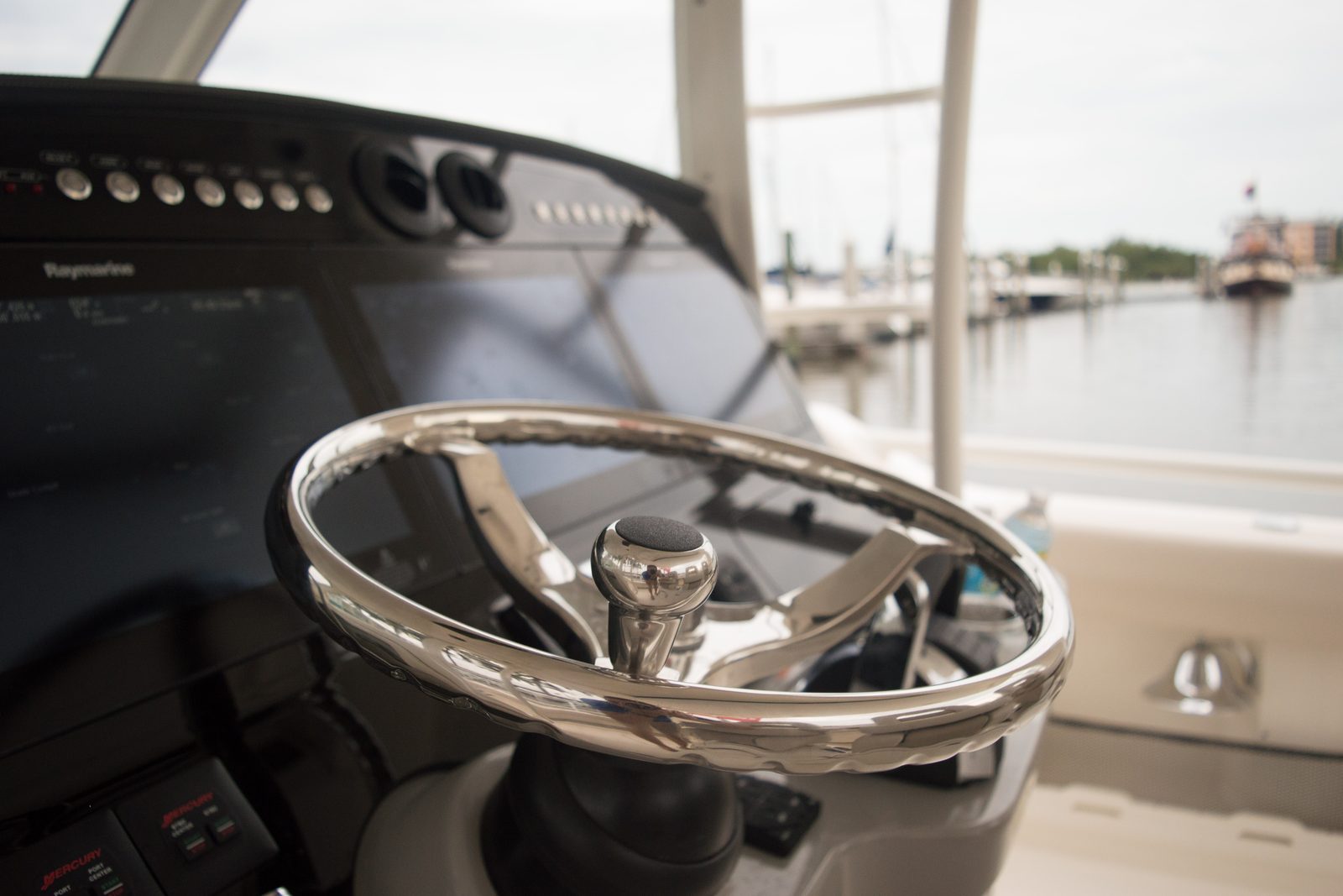 The helm of a motor yacht at its berth